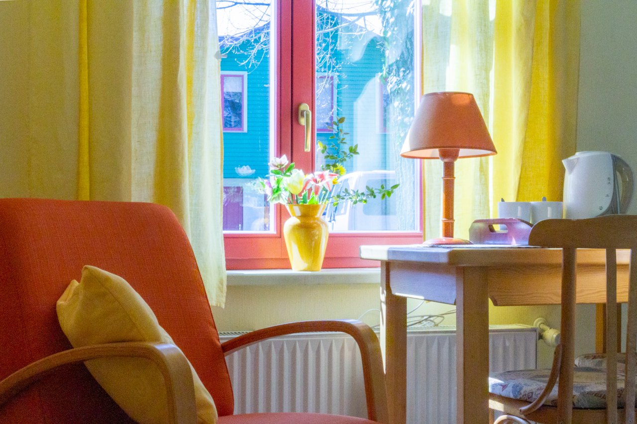 Room with orange armchair